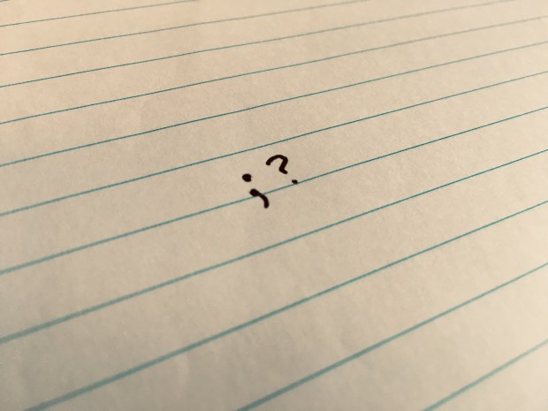 Page with question mark written on it