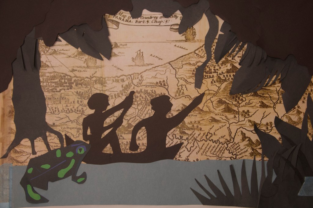 A still from The Shadows of Barro Colorado stop-motion film featuring Barrito, a golden frog inspired by Panamanian pre-Hispanic art.