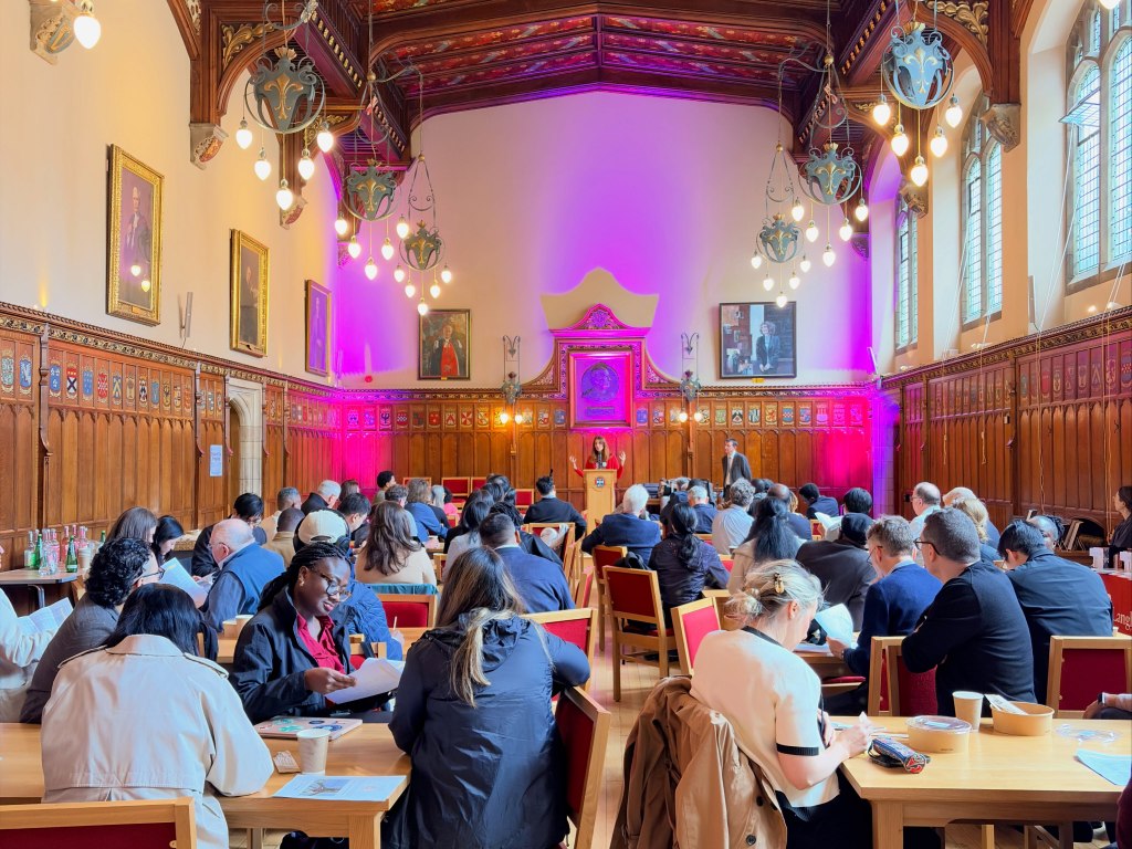 Attendees seated in the Rainy Hall at the University of Edinburgh, School of Divinity - Yale-Edinburgh Conference 2026