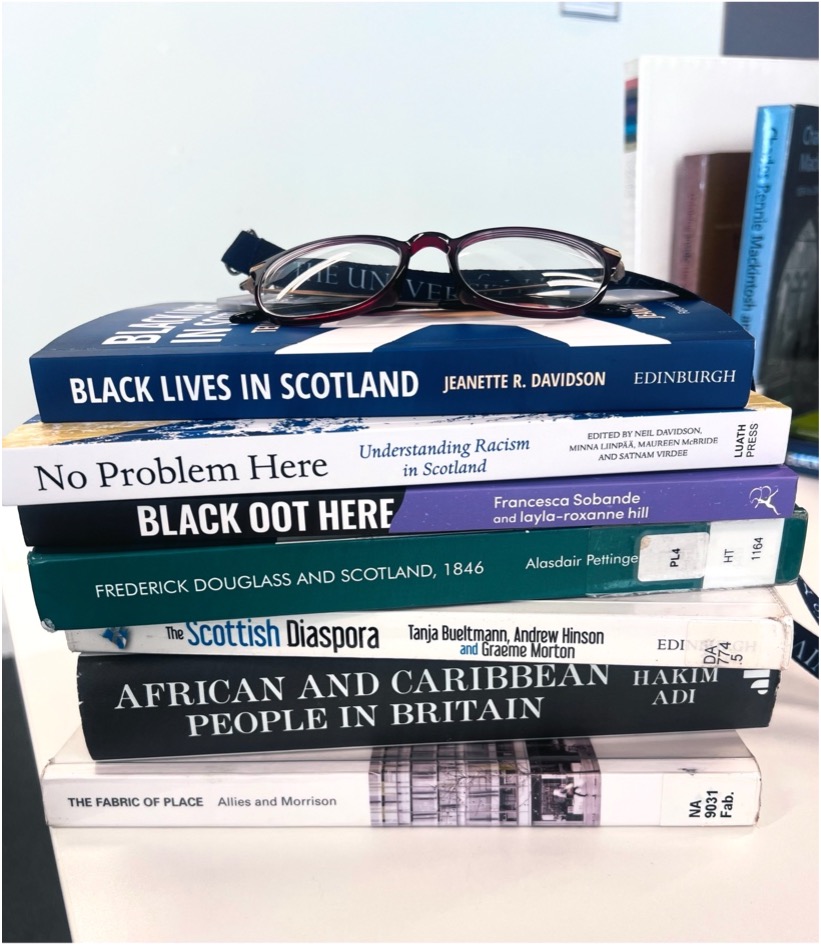A stack of books relating to Scottish Black History